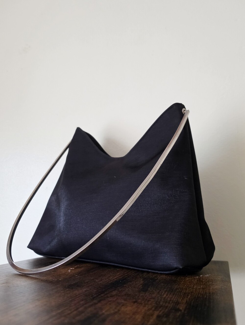 Minimalist Black Shoulder Bag with Silver Metal Handle